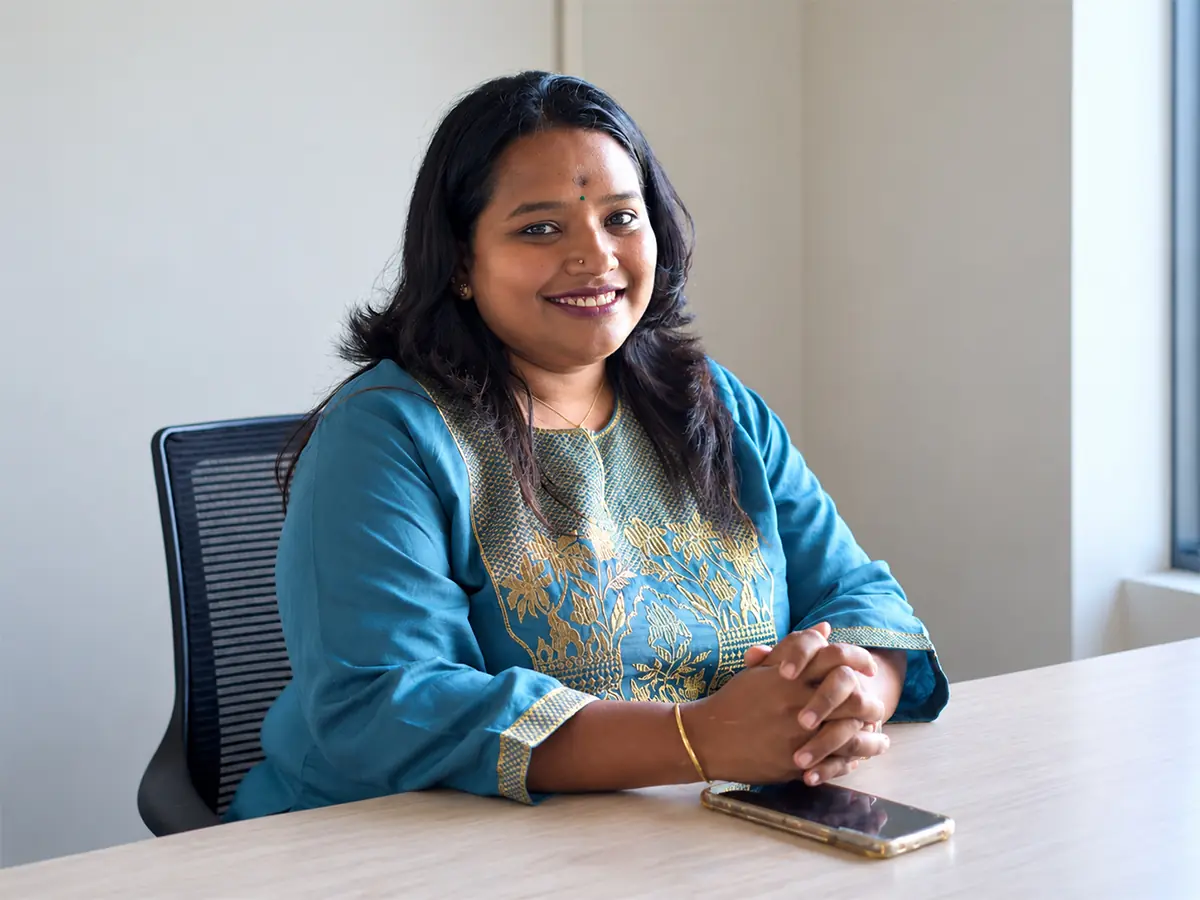 Priyasri Arunchandar working with a client